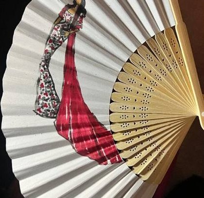 Hand-painted fan with a guest in red