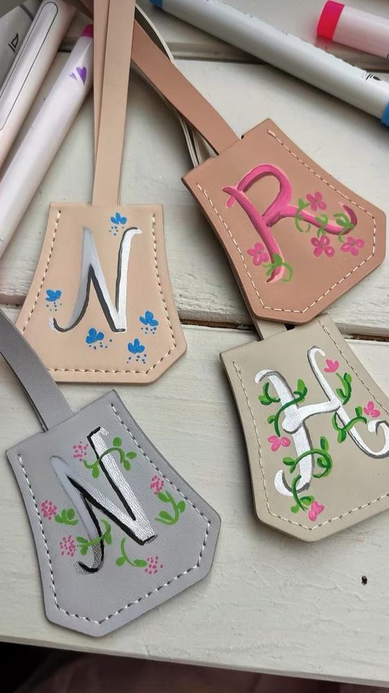 Leather bag tags painted with initials and flowers